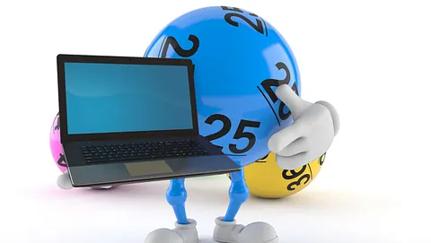 Illustrasjon av bingoball som holder en laptop